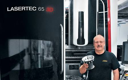 Marv Fiebig, president of PTooling, in front of his new LASERTEC 65 3D